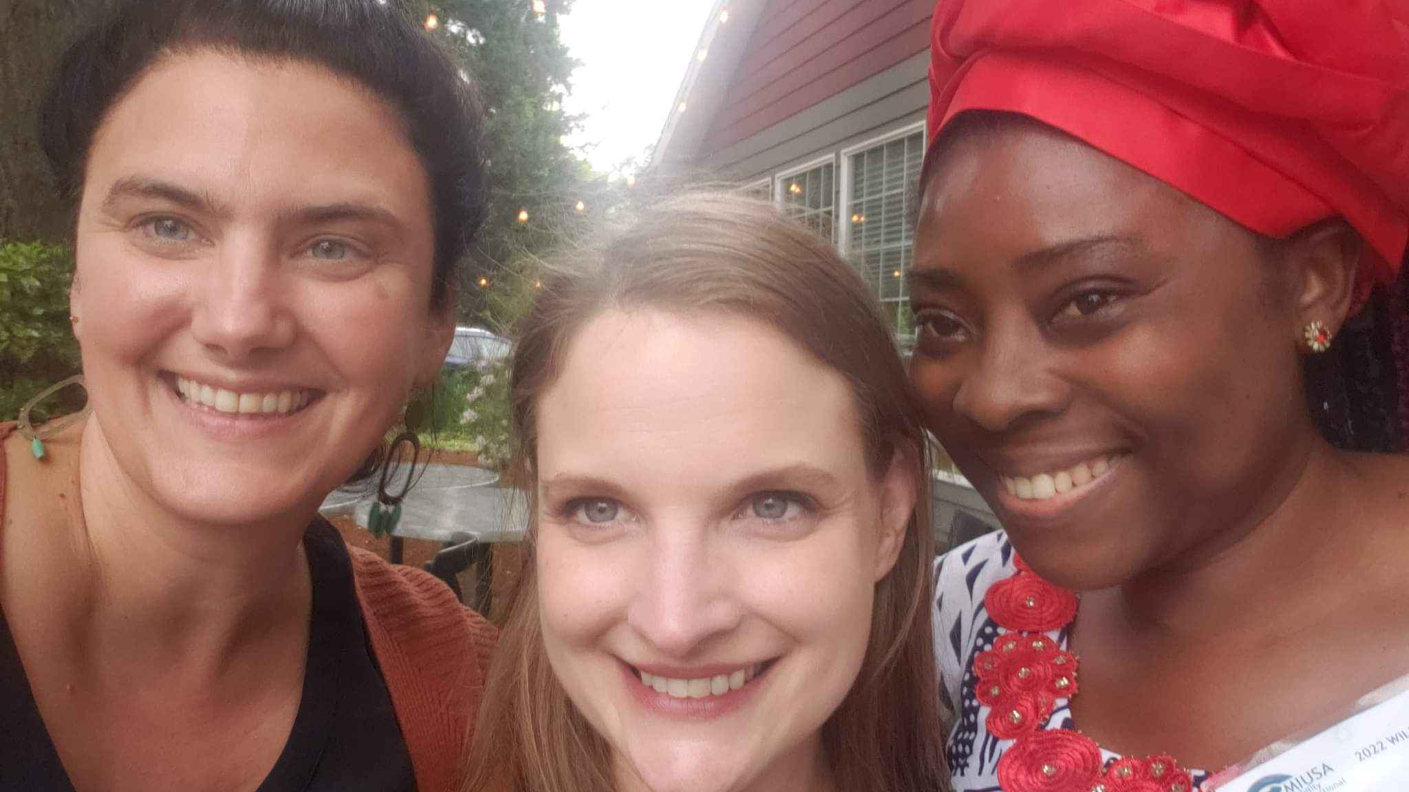 Jensine, Corine and Arrey Smile brightly into the camera at Eugene, Oregon.