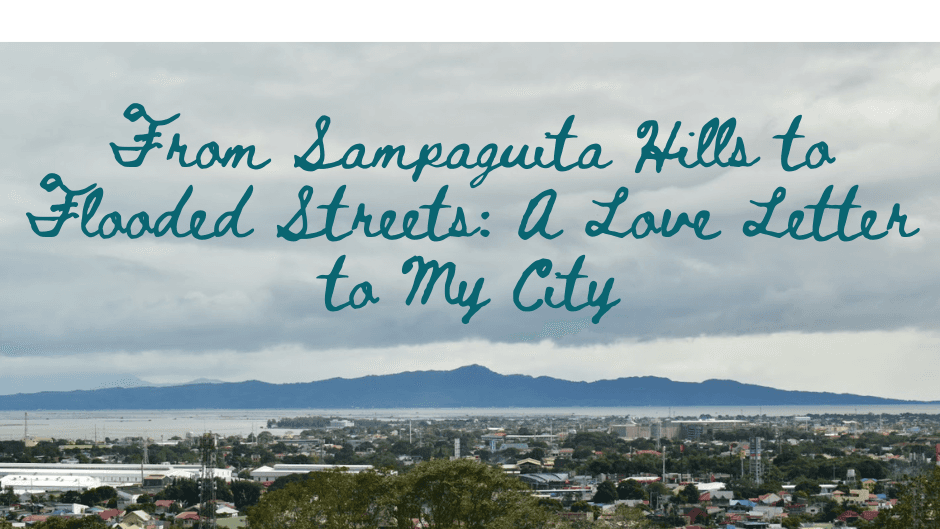 Landscape shot of San Pedro City overlooking the city below and the lake on the horizon