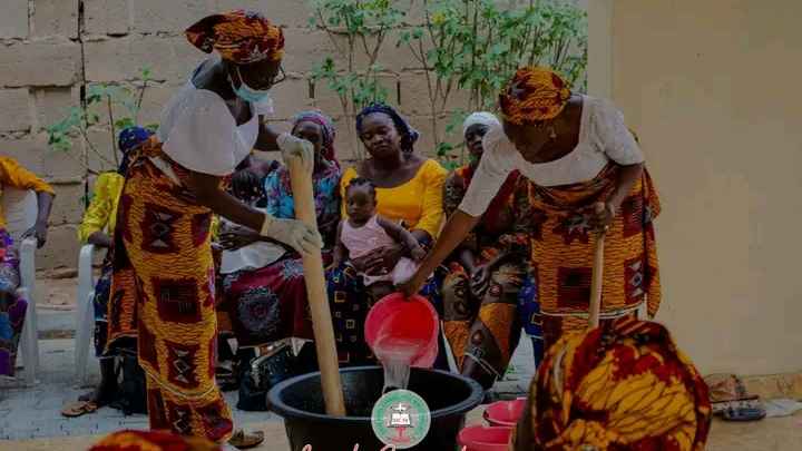 Mothers from my church cooking a meal.