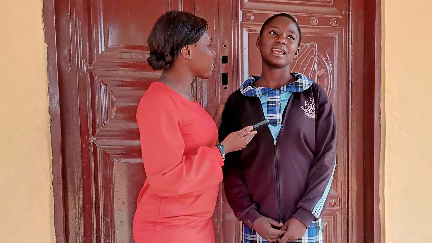 My humble self having an interview with a female student, asking her about her dreams and aspirations during my weekly school outreach