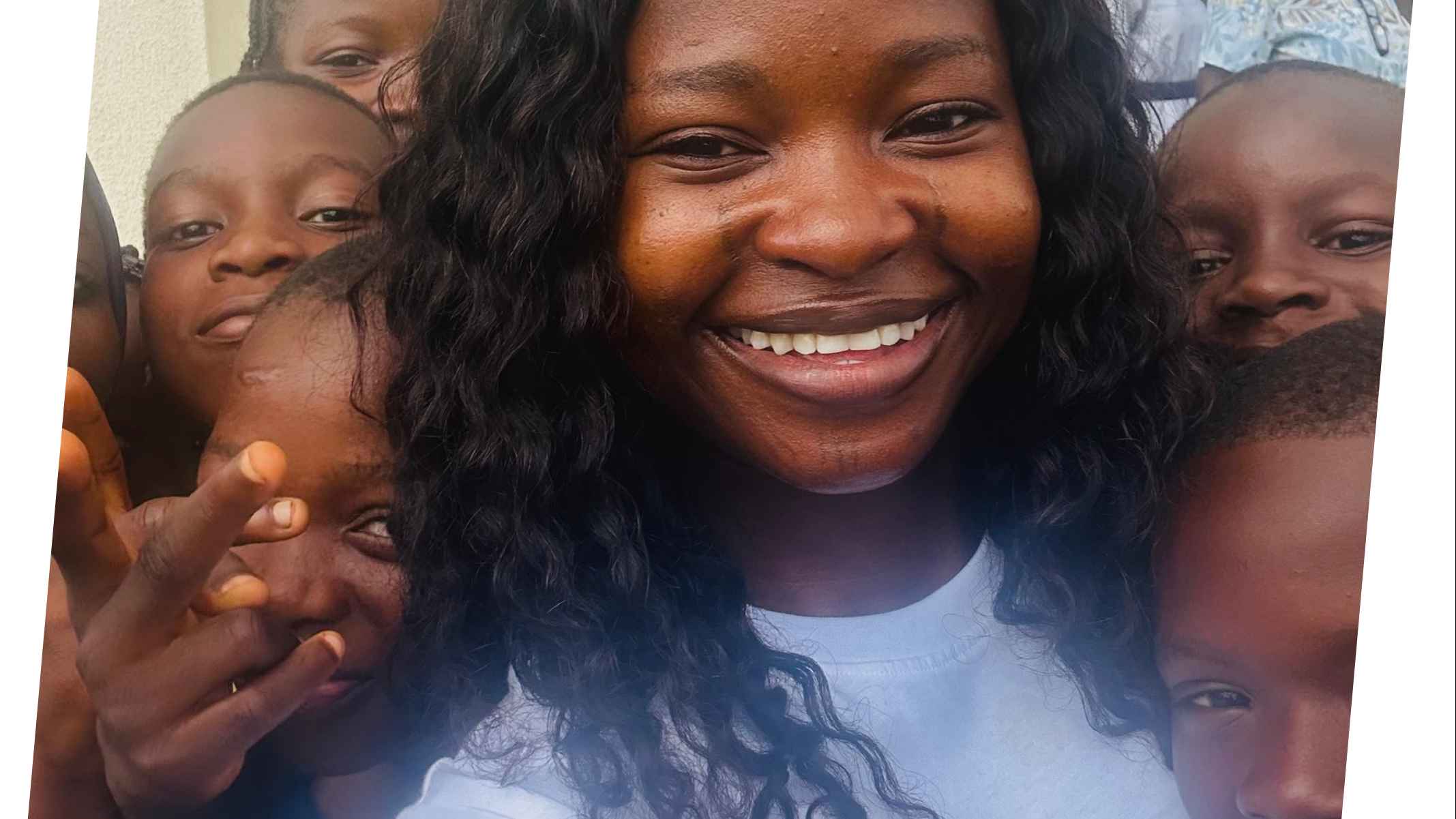 Picture of an education activist with students.