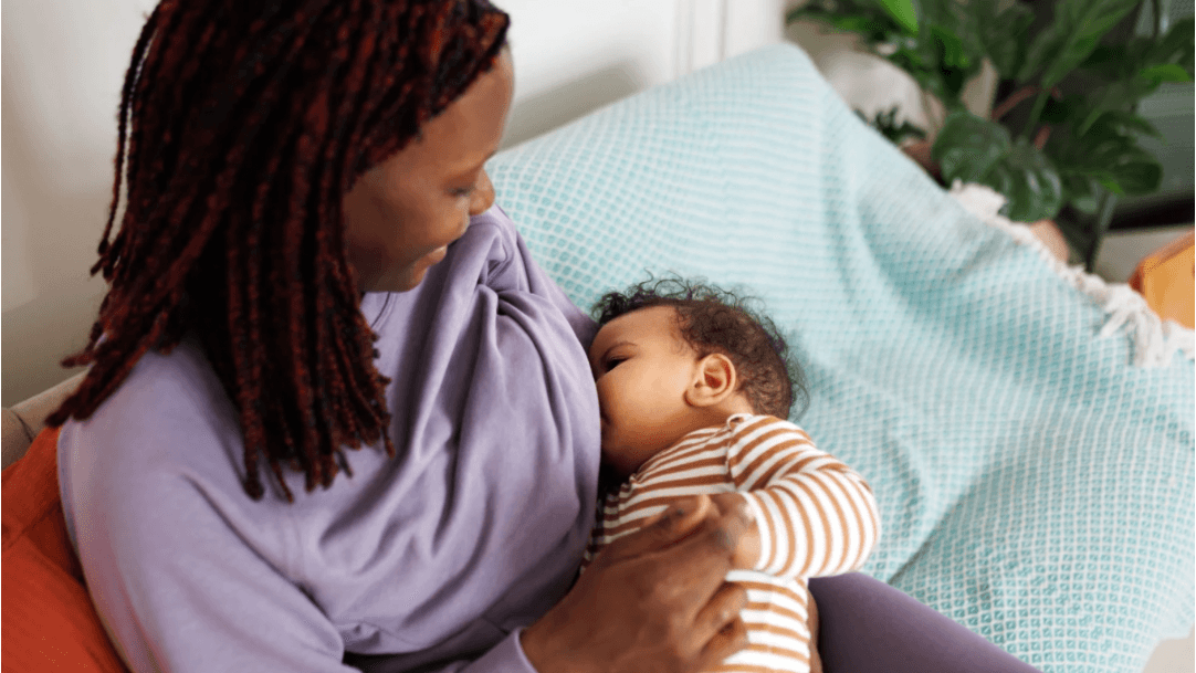 A mother breastfeeding her baby