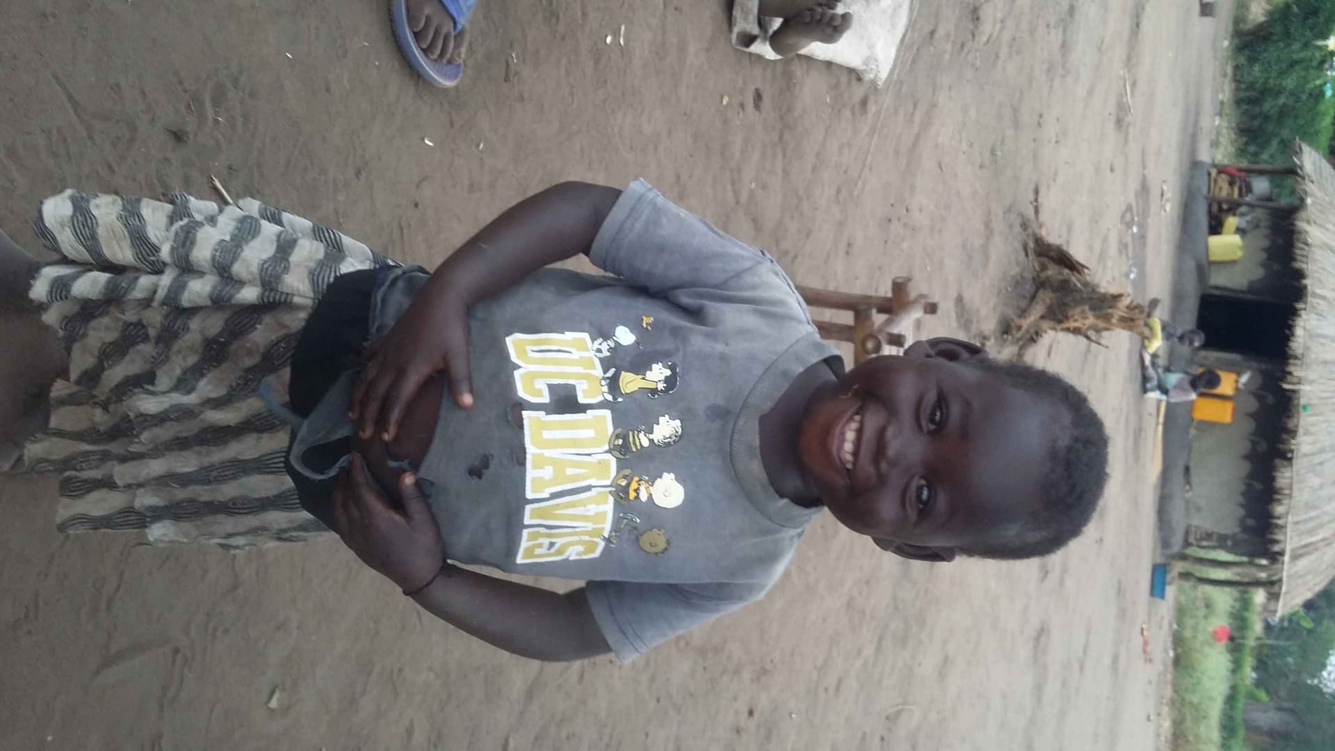 A very inquisitive-bright girl who would love to go to school happily telling me a story