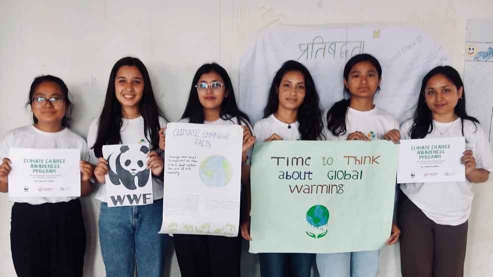 A poster promoting climate change awareness. It also highlights a commitment to climate chaange action.