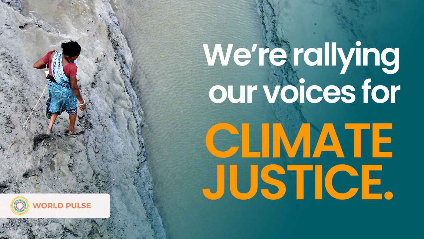 Image shows a woman standing on a muddy bank looking into cloudy water. Words read: We're rallying our voices for climate justice. There is a World Pulse logo in the left corner.
