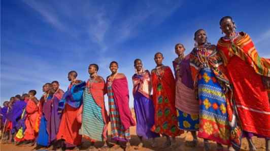 Women in Maasai attire stand strong, embodying resilience, culture, and the unshakable power of African girls.