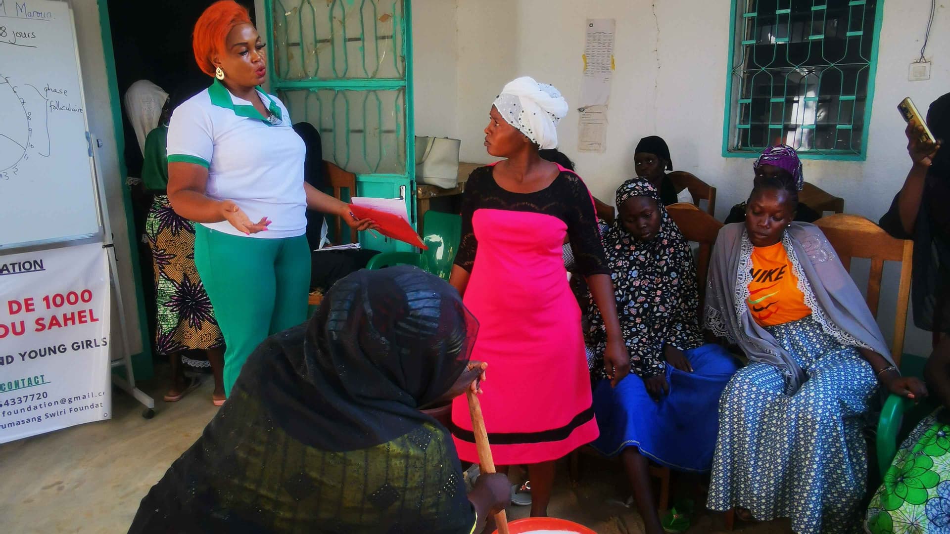 Picture taken in one of the training sessions when women were given an educative talk on menstrual hygiene and also trained on how to produce bleach