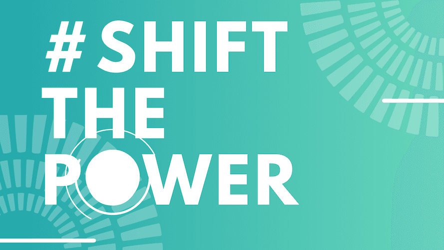Blue and green background with World Pulse logo. The text reads #Shift The Power.